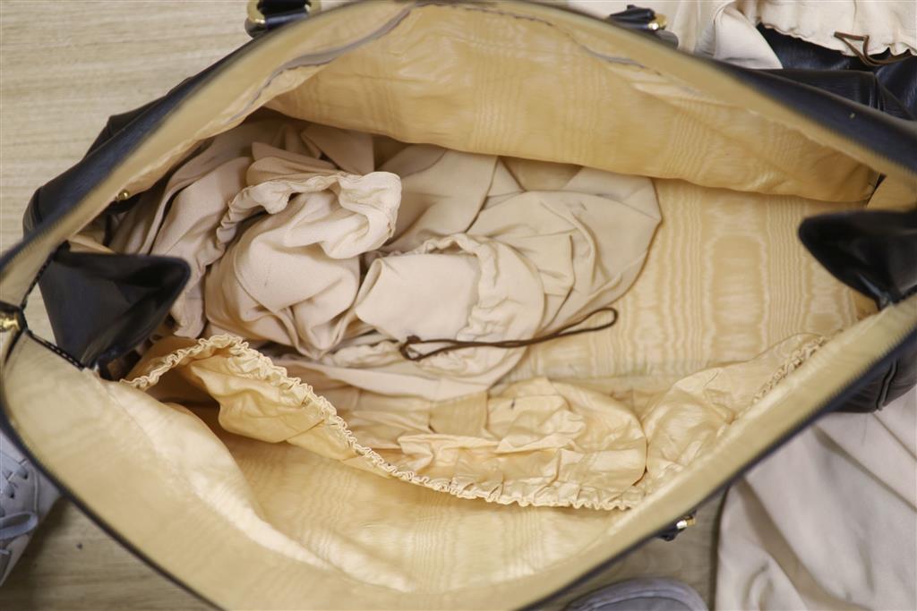 Two Chloe holdalls